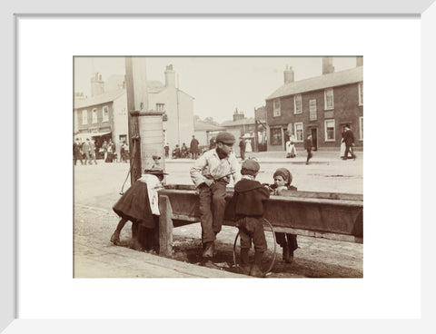 Children Children playing at a water trough in Barnet High Street c.1900