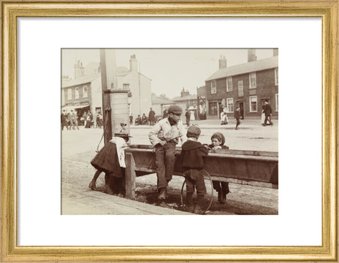 Children Children playing at a water trough in Barnet High Street c.1900