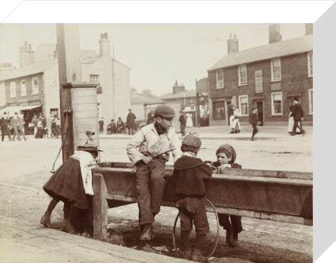 Children Children playing at a water trough in Barnet High Street c.1900