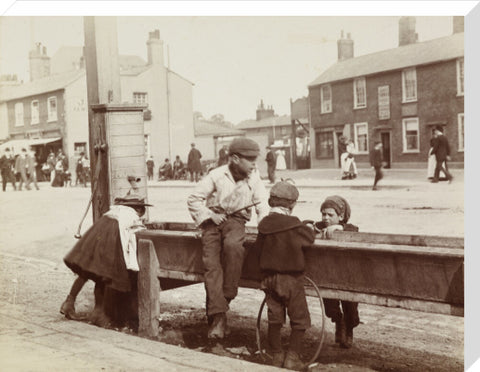 Children Children playing at a water trough in Barnet High Street c.1900
