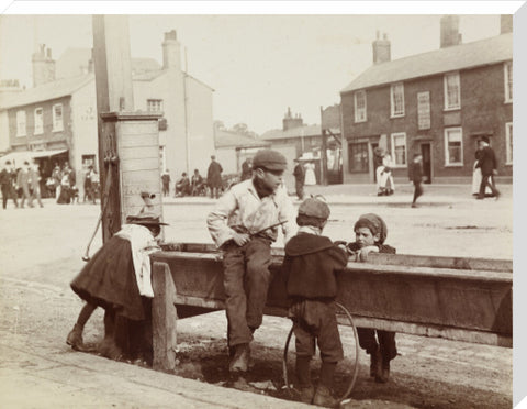 Children Children playing at a water trough in Barnet High Street c.1900