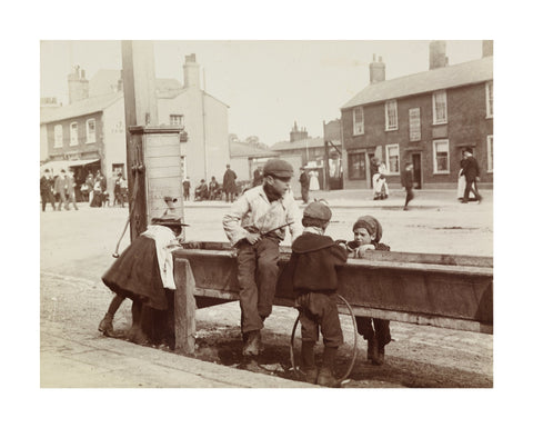 Children Children playing at a water trough in Barnet High Street c.1900
