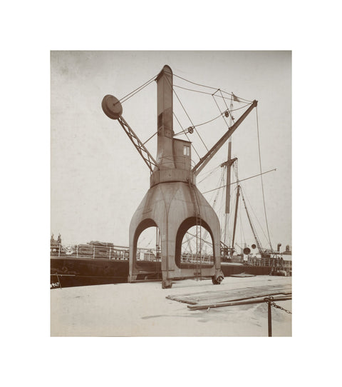 Disharge of cargo by hydraulic crane c.1920