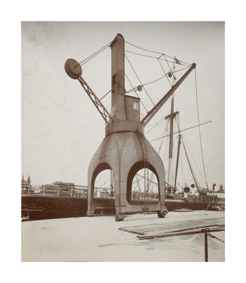 Disharge of cargo by hydraulic crane c.1920
