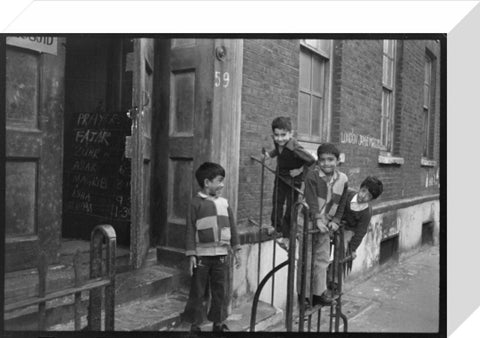 Children at the door of the Brick Lane Jamme Masjid Mosque 1976