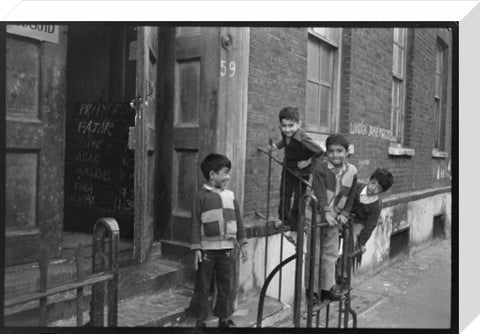 Children at the door of the Brick Lane Jamme Masjid Mosque 1976
