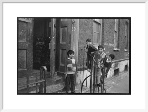 Children at the door of the Brick Lane Jamme Masjid Mosque 1976