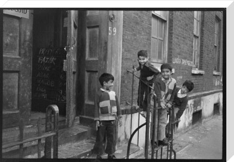 Children at the door of the Brick Lane Jamme Masjid Mosque 1976