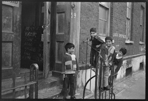 Children at the door of the Brick Lane Jamme Masjid Mosque 1976