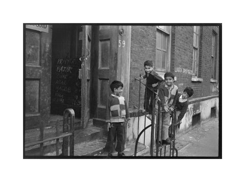 Children at the door of the Brick Lane Jamme Masjid Mosque 1976