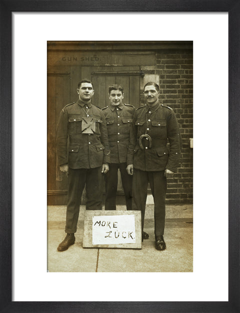 Three soldiers stand with a message of Hope c.1914