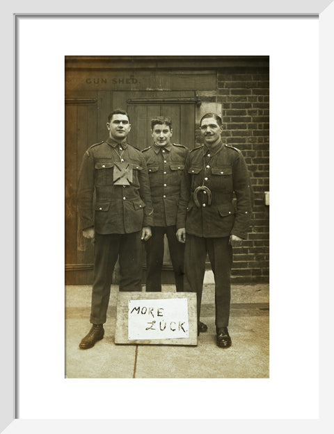 Three soldiers stand with a message of Hope c.1914