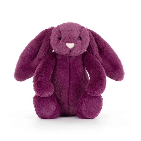 Purple plush bunny toy on a white background facing forward