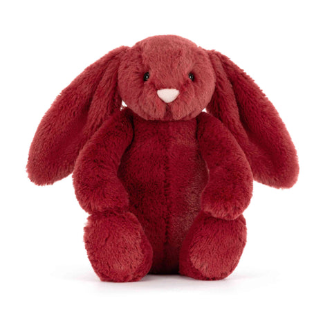 Red plush bunny toy on a white background facing forward