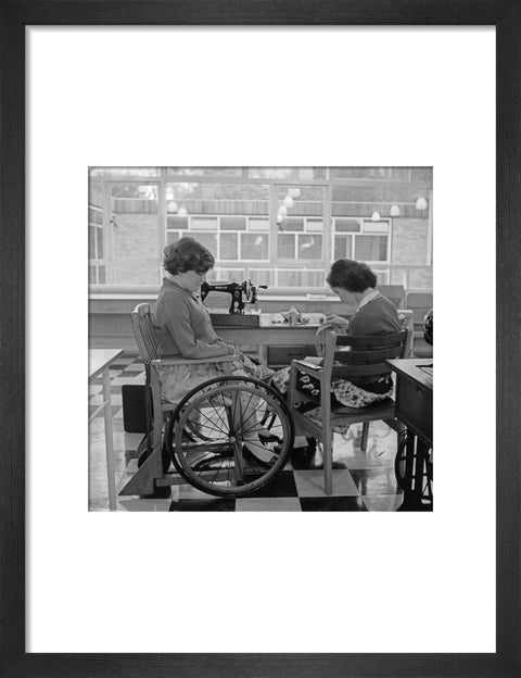 Two children at the 'FDR School for Handicapped Children', Hampstead, working in the handicraft room