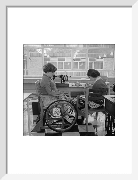 Two children at the 'FDR School for Handicapped Children', Hampstead, working in the handicraft room