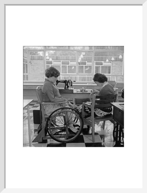 Two children at the 'FDR School for Handicapped Children', Hampstead, working in the handicraft room
