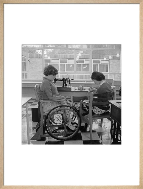 Two children at the 'FDR School for Handicapped Children', Hampstead, working in the handicraft room