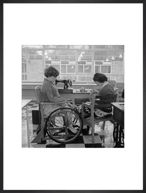 Two children at the 'FDR School for Handicapped Children', Hampstead, working in the handicraft room