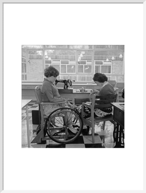 Two children at the 'FDR School for Handicapped Children', Hampstead, working in the handicraft room