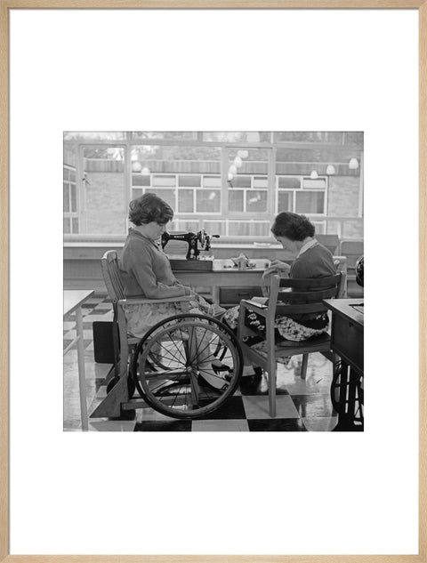Two children at the 'FDR School for Handicapped Children', Hampstead, working in the handicraft room