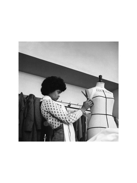 A female student works on a dressmaker's mannequin at Southgate Technical College