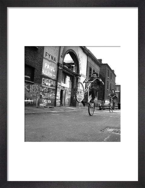 Teenagers on bicycles
