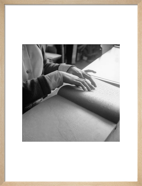 Close up of hands of child reading Braille at the Linden Lodge School for the Blind.