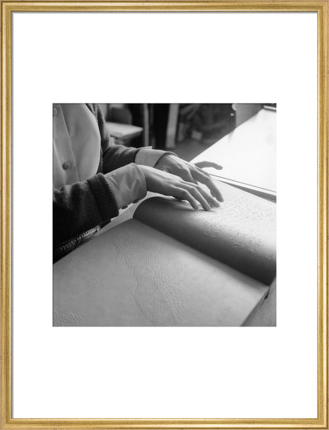 Close up of hands of child reading Braille at the Linden Lodge School for the Blind.