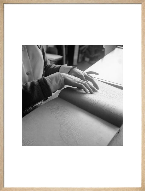 Close up of hands of child reading Braille at the Linden Lodge School for the Blind.