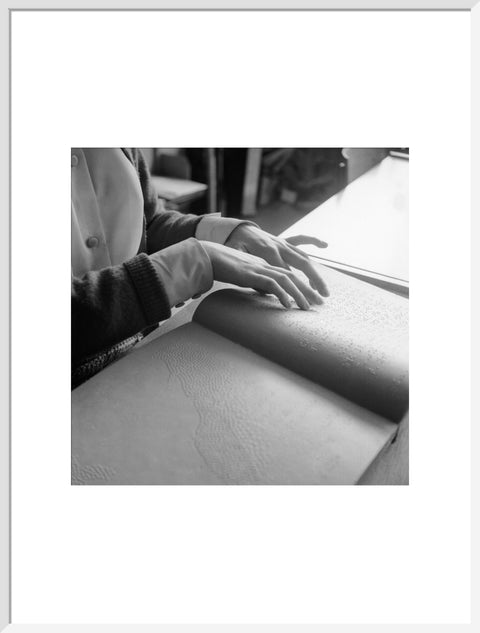 Close up of hands of child reading Braille at the Linden Lodge School for the Blind.