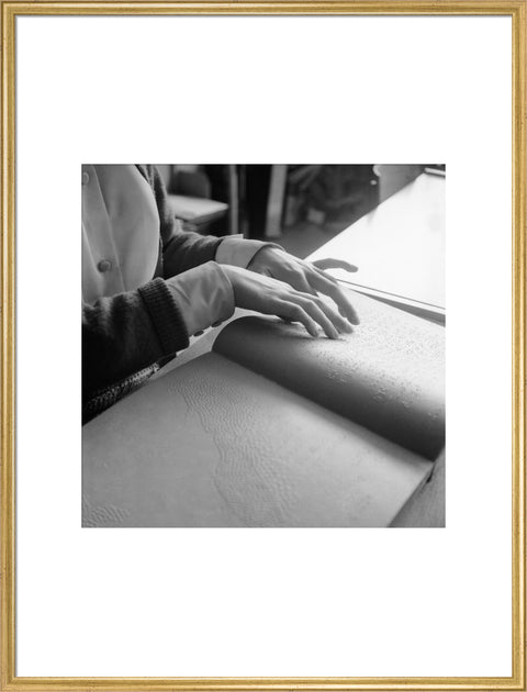 Close up of hands of child reading Braille at the Linden Lodge School for the Blind.