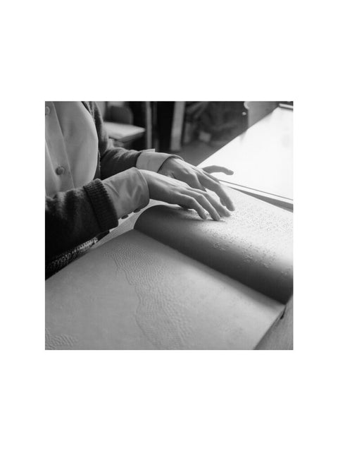 Close up of hands of child reading Braille at the Linden Lodge School for the Blind.