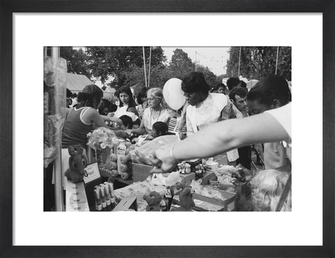 Local community enjoying a stall at Brent Fair, 1973.