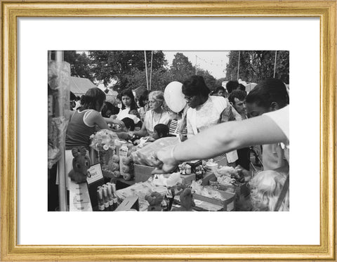 Local community enjoying a stall at Brent Fair, 1973.