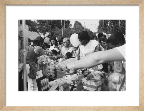Local community enjoying a stall at Brent Fair, 1973.