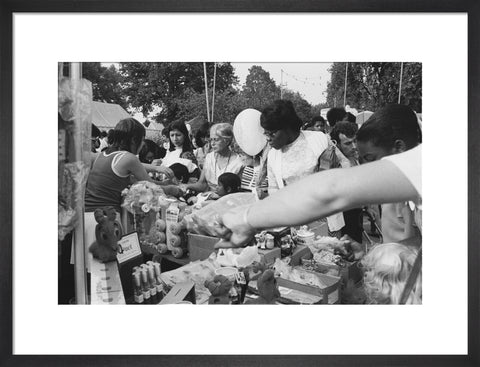 Local community enjoying a stall at Brent Fair, 1973.