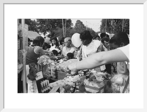 Local community enjoying a stall at Brent Fair, 1973.