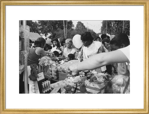 Local community enjoying a stall at Brent Fair, 1973.