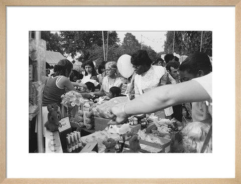 Local community enjoying a stall at Brent Fair, 1973.