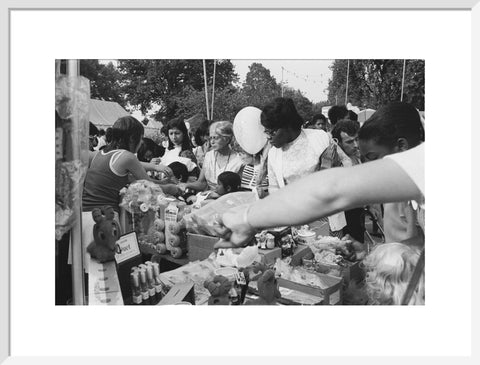 Local community enjoying a stall at Brent Fair, 1973.