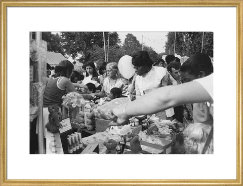 Local community enjoying a stall at Brent Fair, 1973.
