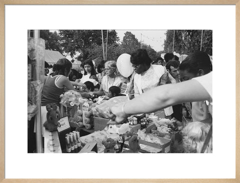 Local community enjoying a stall at Brent Fair, 1973.