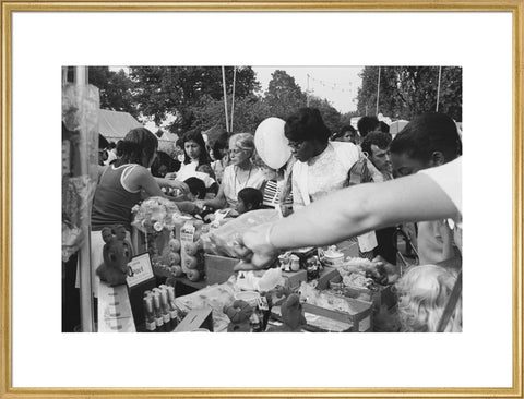 Local community enjoying a stall at Brent Fair, 1973.