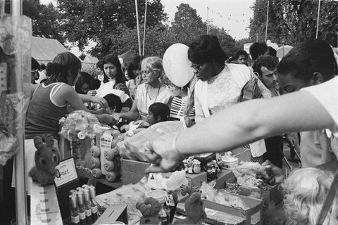 Local community enjoying a stall at Brent Fair, 1973.