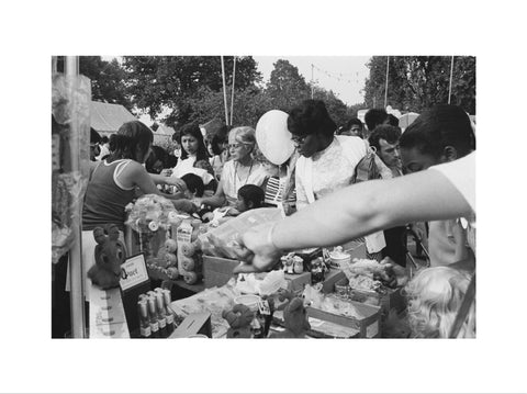 Local community enjoying a stall at Brent Fair, 1973.