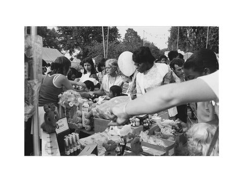 Local community enjoying a stall at Brent Fair, 1973.