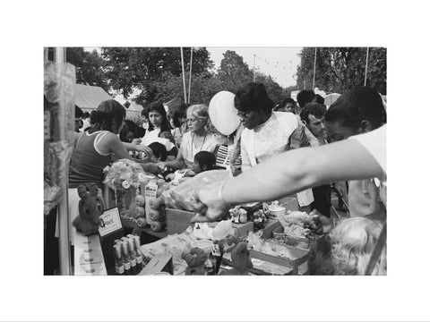Local community enjoying a stall at Brent Fair, 1973.