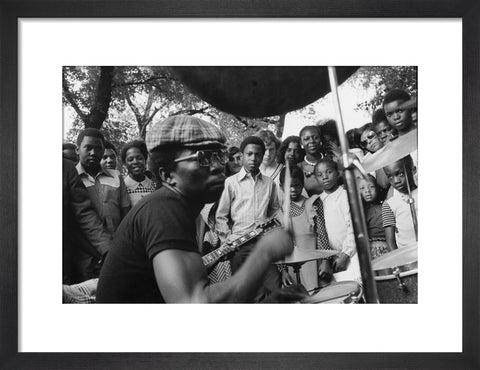 Band playing music to crowd at fun fair, Brent Cross 1973