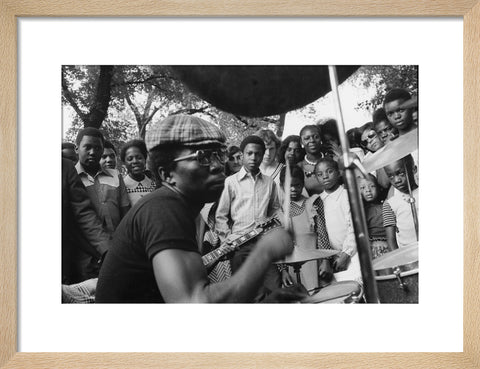 Band playing music to crowd at fun fair, Brent Cross 1973